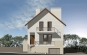Проект узкого дома с мансардой, цоколем и гаражом Rg3352 Фасад3