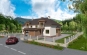 Дом с мансардой, гаражом, террасой и балконами Rg3208z (Зеркальная версия) Вид1