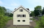 Проект индивидуального одноэтажного жилого дома с мансардой в американском стиле Rg4988z (Зеркальная версия) Фасад2